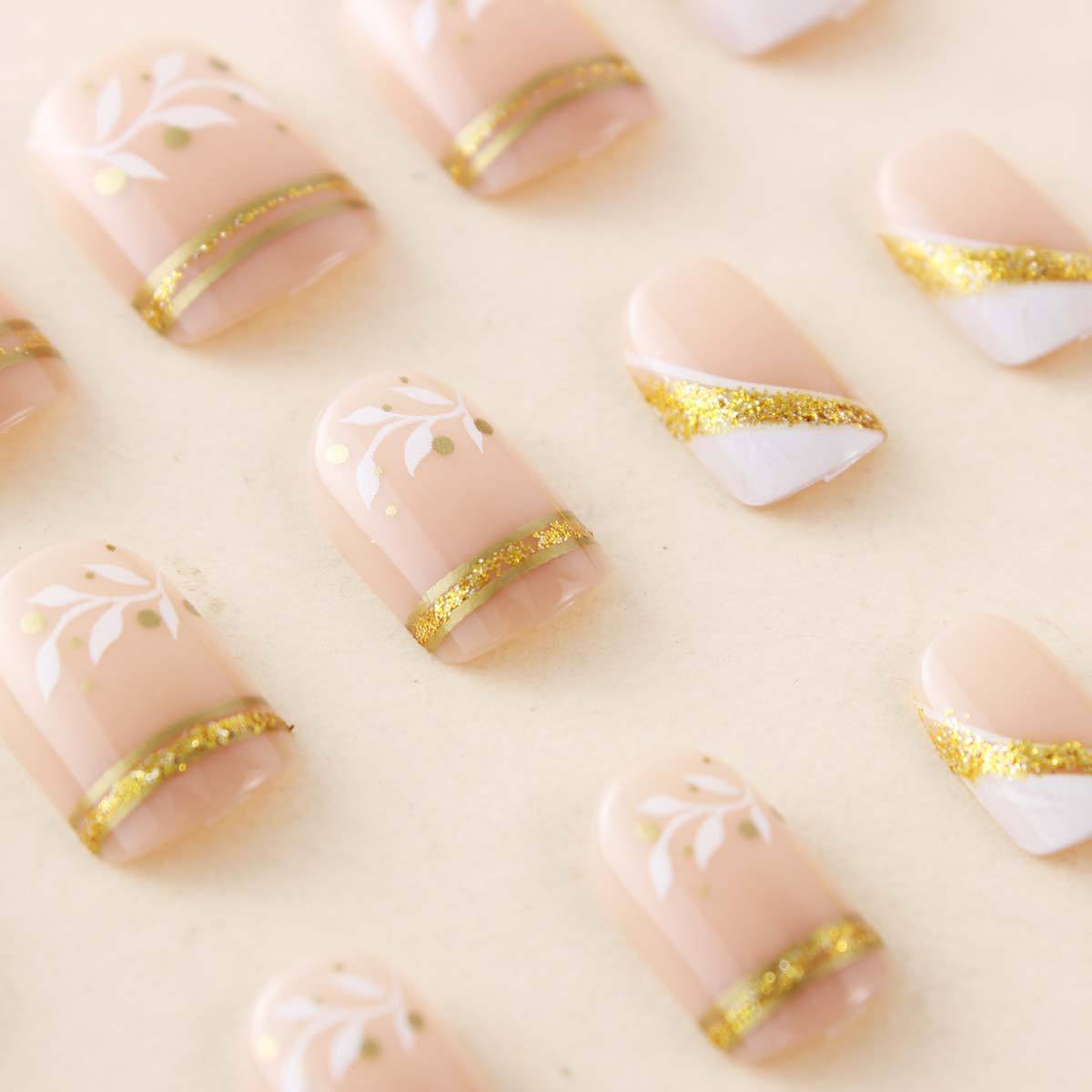 เล็บปลอมแบบกดติดสีขาวลายใบไม้ป - Nail Art Glitter บทวิจารณ์และราคา